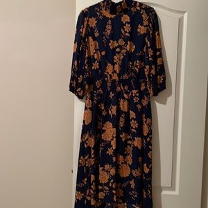 Beautiful dress. Dress up or dress down. Floral print navy blue and orange
